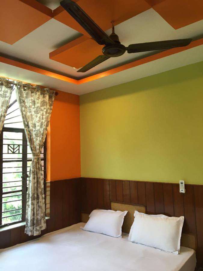 Whispering Woods Inn Bolpur Bagian luar foto