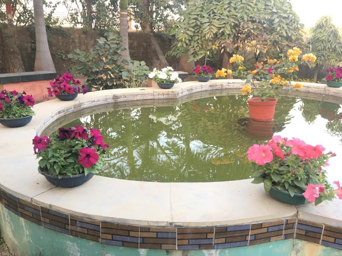 Whispering Woods Inn Bolpur Bagian luar foto
