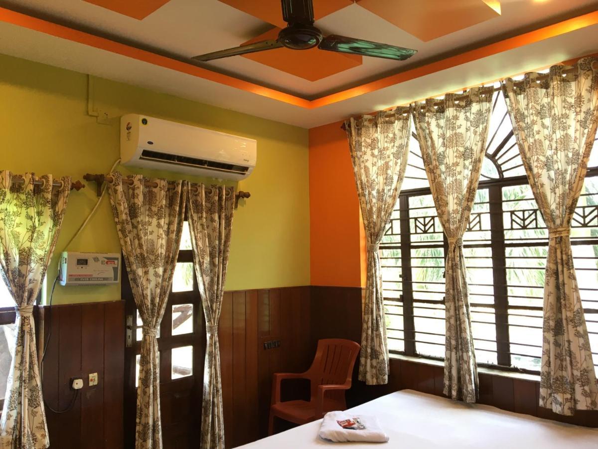 Whispering Woods Inn Bolpur Bagian luar foto